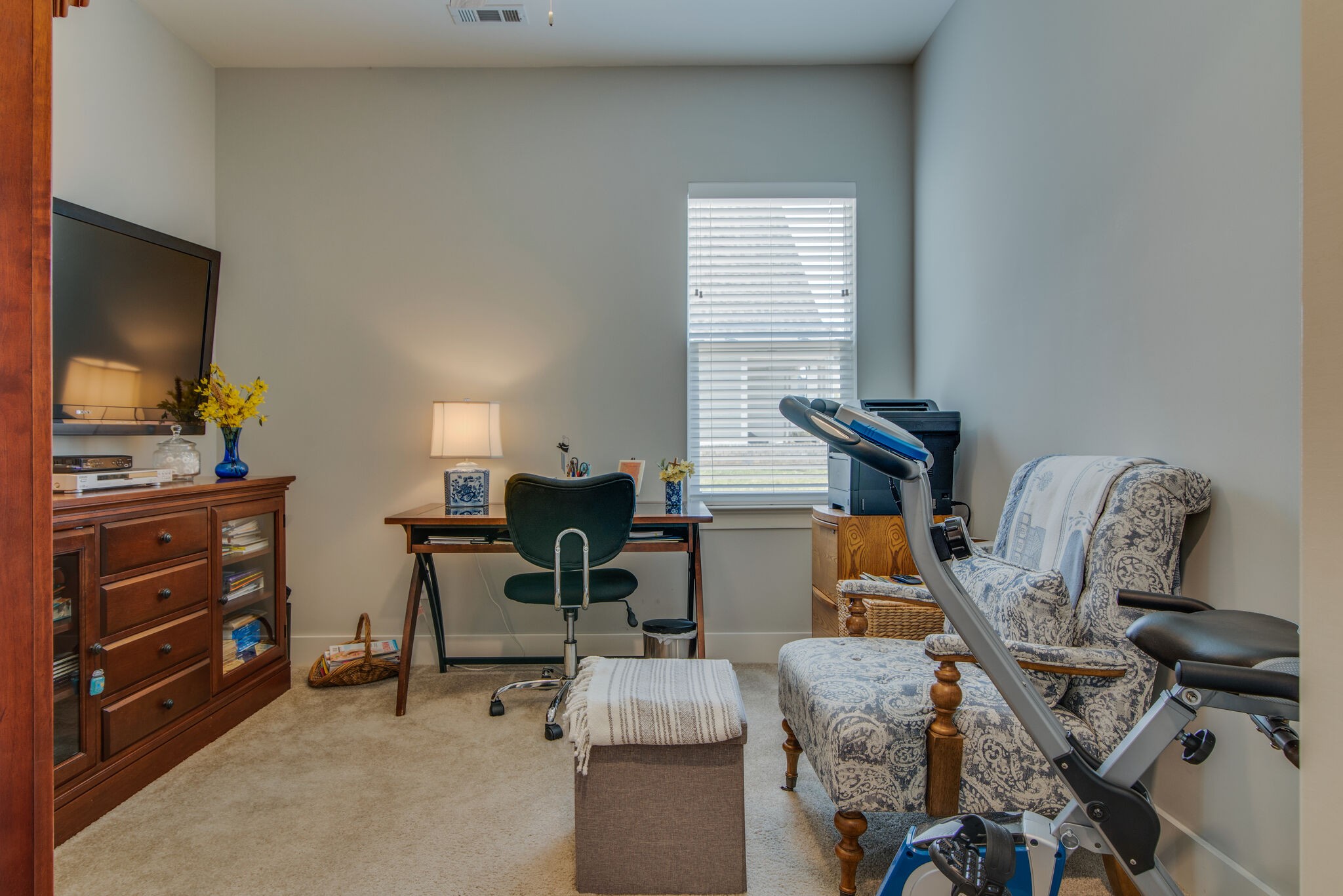 780 Plowson Road Mount Juliet, TN 37122 - Photo 24 of 41 a living room with furniture and a flat screen tv