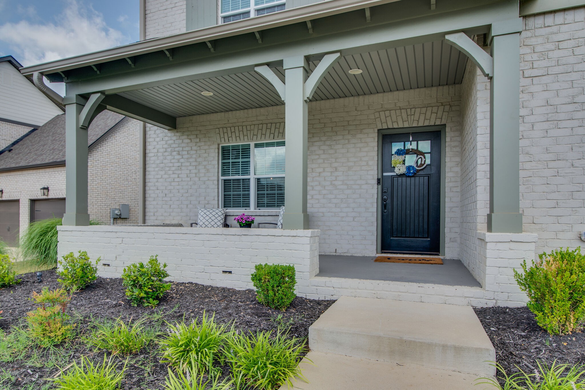 780 Plowson Road Mount Juliet, TN 37122 - Photo 3 of 41 a front view of a house with garden