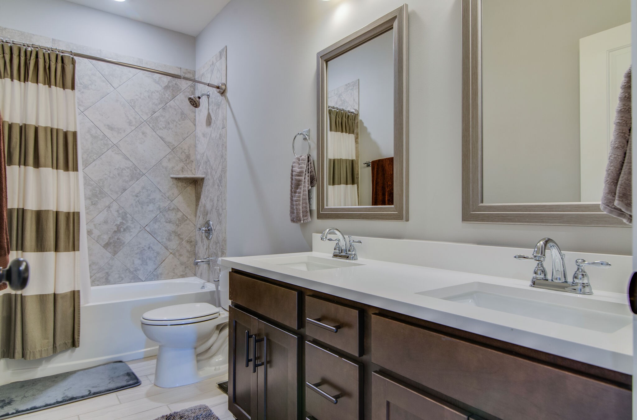 780 Plowson Road Mount Juliet, TN 37122 - Photo 34 of 41 a bathroom with a sink a toilet and shower