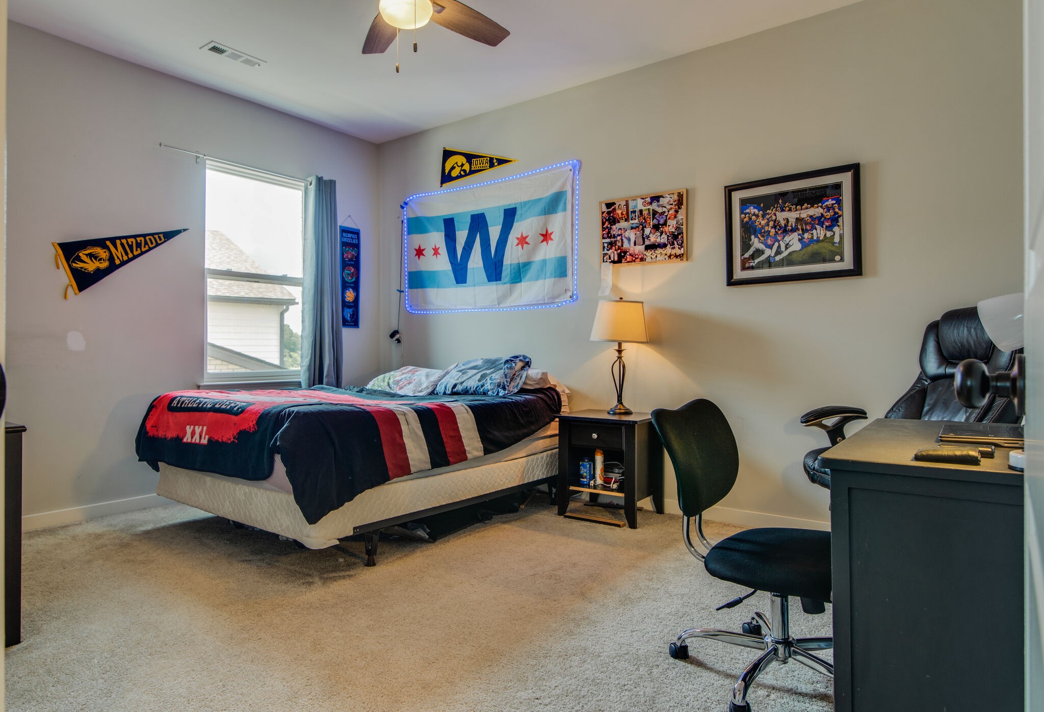 780 Plowson Road Mount Juliet, TN 37122 - Photo 36 of 41 a bedroom with a bed a desk and chair