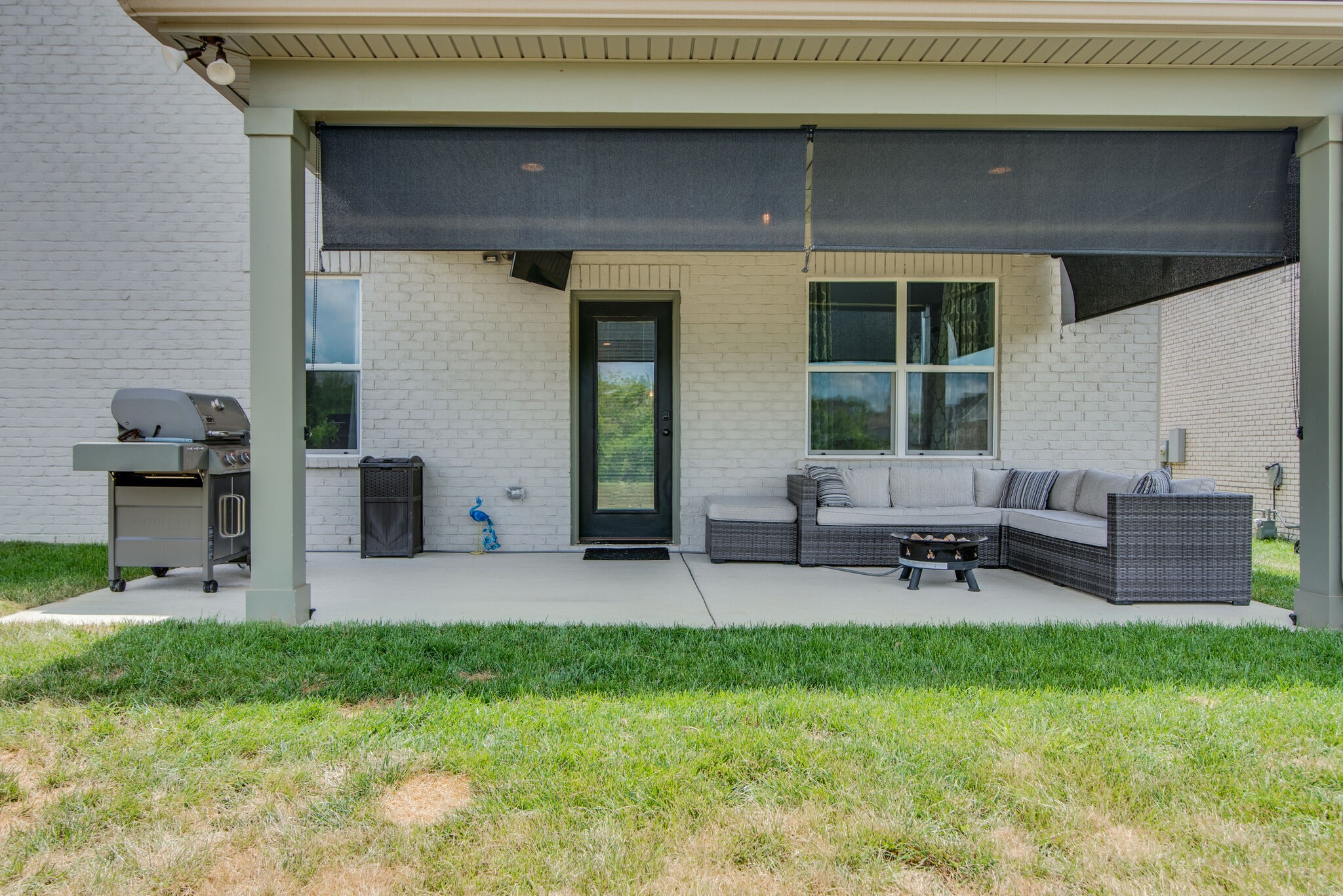 780 Plowson Road Mount Juliet, TN 37122 - Photo 38 of 41 a backyard of a house with table and chairs