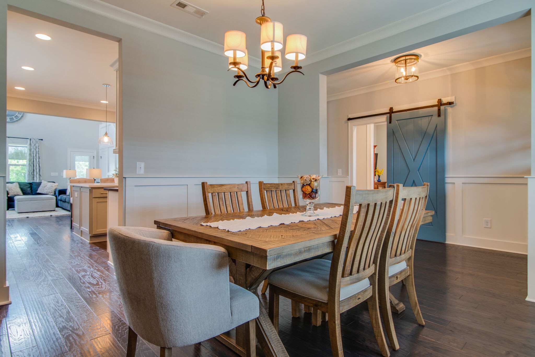 780 Plowson Road Mount Juliet, TN 37122 - Photo 7 of 41 a view of a dining room with furniture wooden floor and chandelier