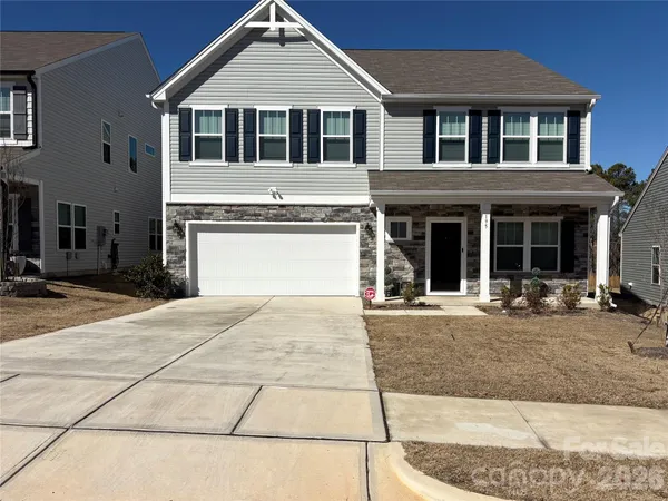 a front view of a house with entertaining space