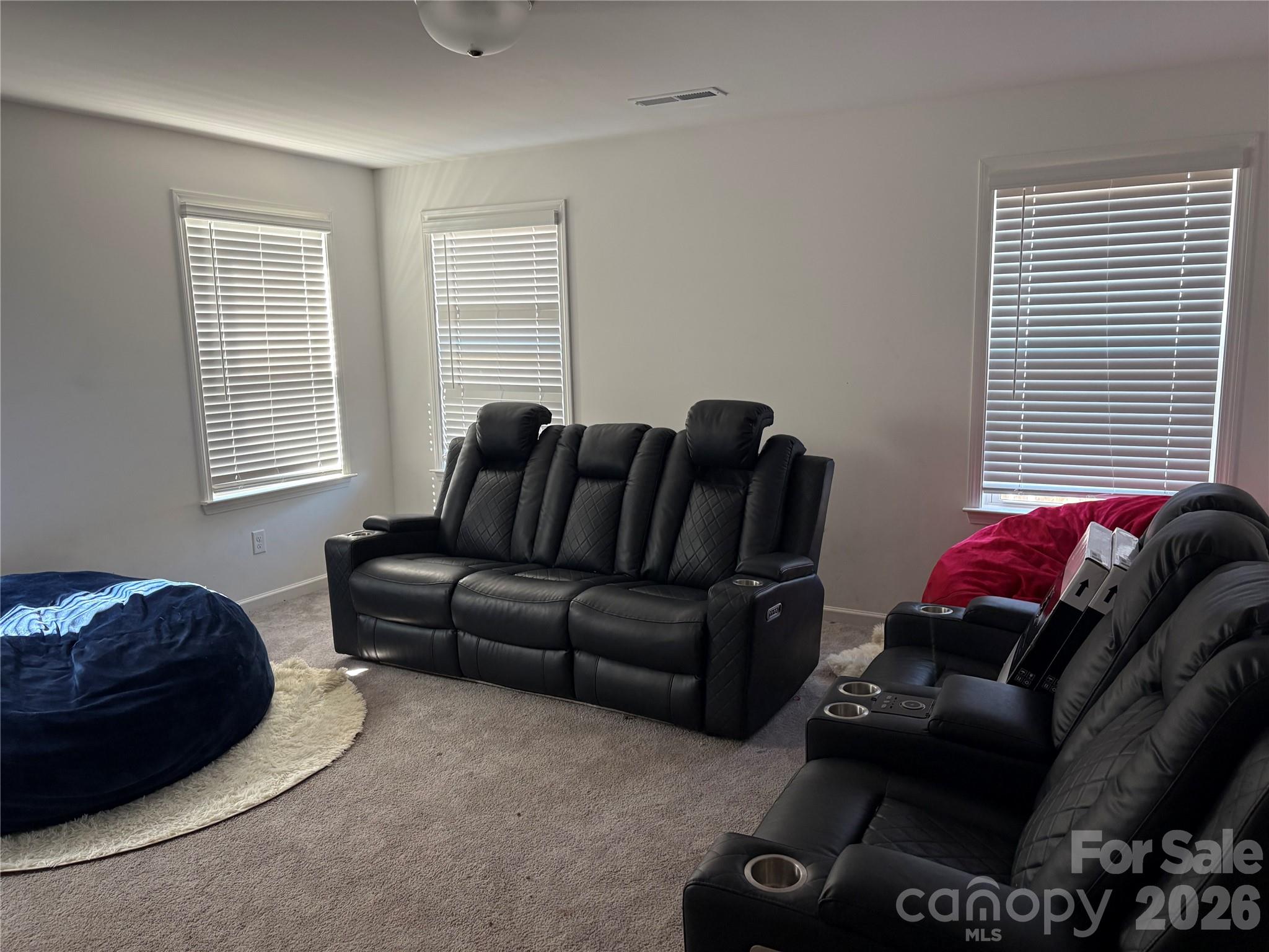 195 Batten Rdg Drive Statesville, NC 28677 - Photo 22 of 34 a living room with furniture a window and a couch