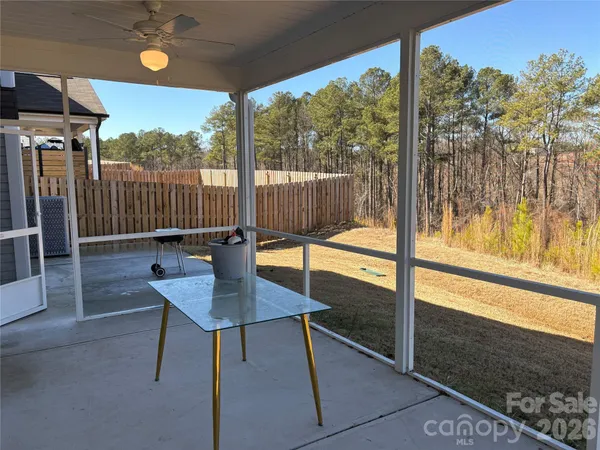 a view of a porch with chairs