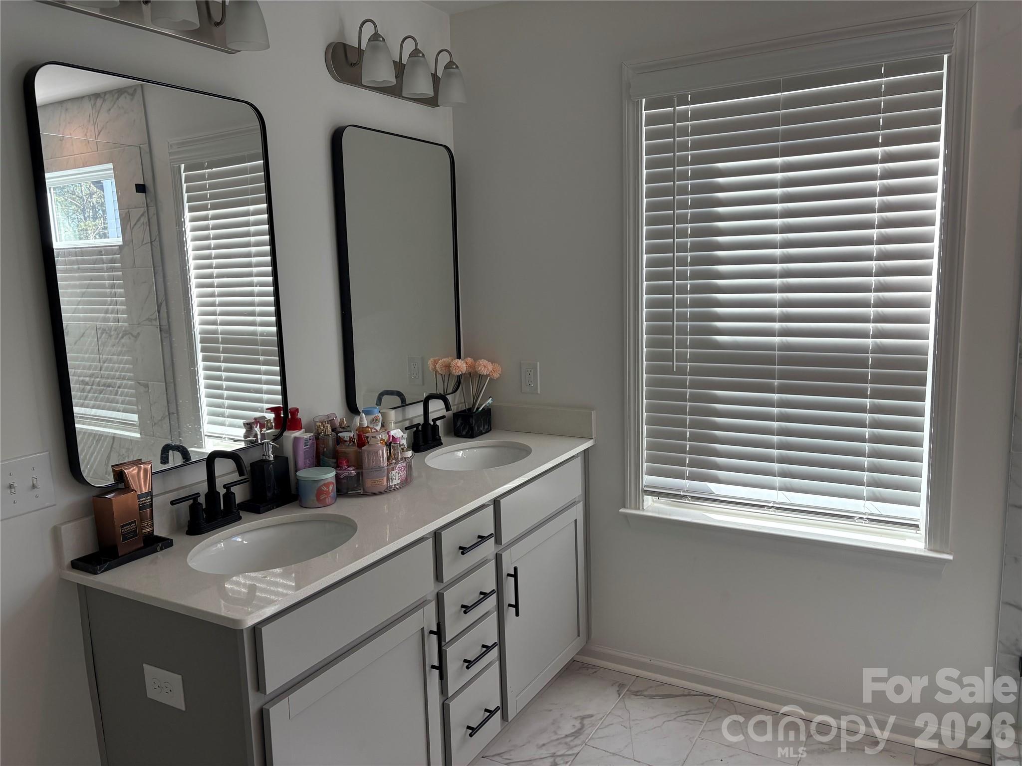 195 Batten Rdg Drive Statesville, NC 28677 - Photo 30 of 34 a bathroom with a sink a vanity and a mirror