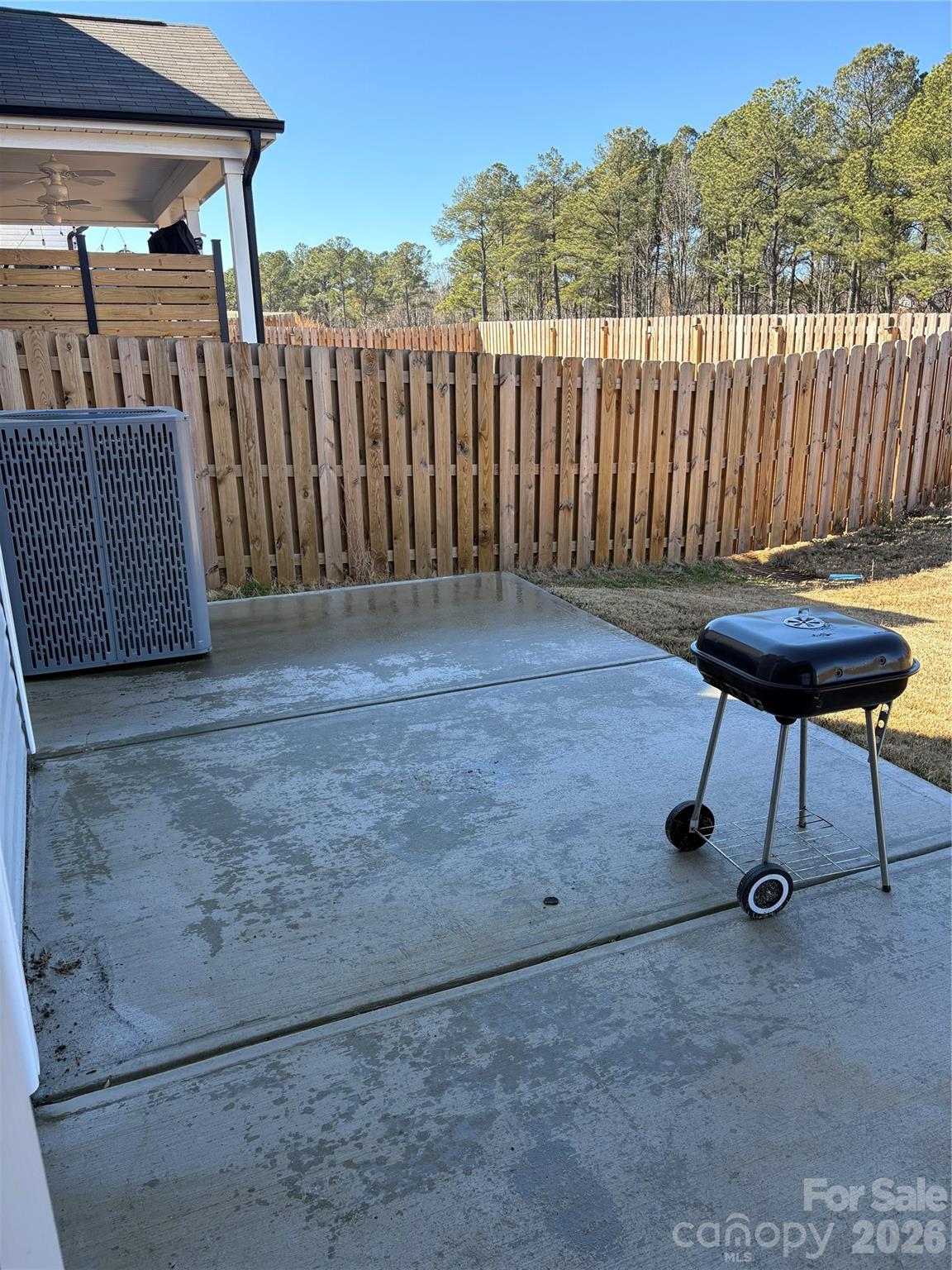 195 Batten Rdg Drive Statesville, NC 28677 - Photo 31 of 34 a view of a chairs and table in the back yard of the house