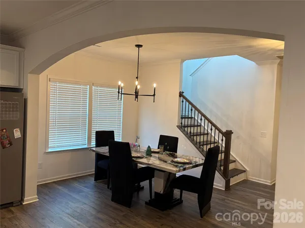 a view of a livingroom with furniture and window