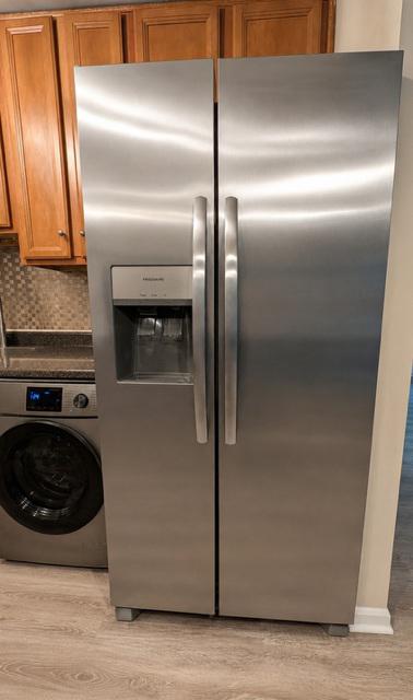 109 Cross Keys Road, Unit R109F Baltimore, MD 21210 - Photo 9 of 28 stainless steel refrigerator.
