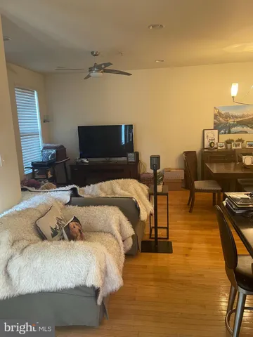 a bedroom with a bed and lamp