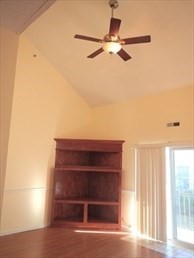 64 Tennis Plaza Road, Unit 2 Dracut, MA 01826 - Photo 4 of 11 a view of entryway and hall with wooden floor