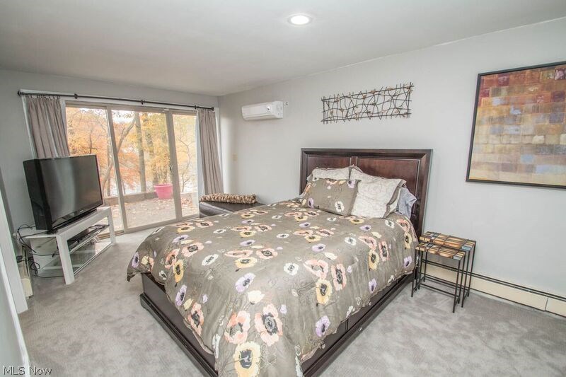 1007 Stewart Road Kent, OH 44240 - Photo 17 of 35 Lower level bedroom with sliders to back.