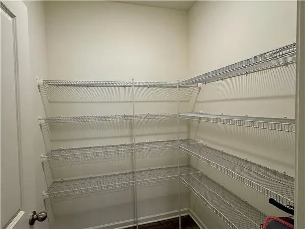a view of a room with racks on the wall