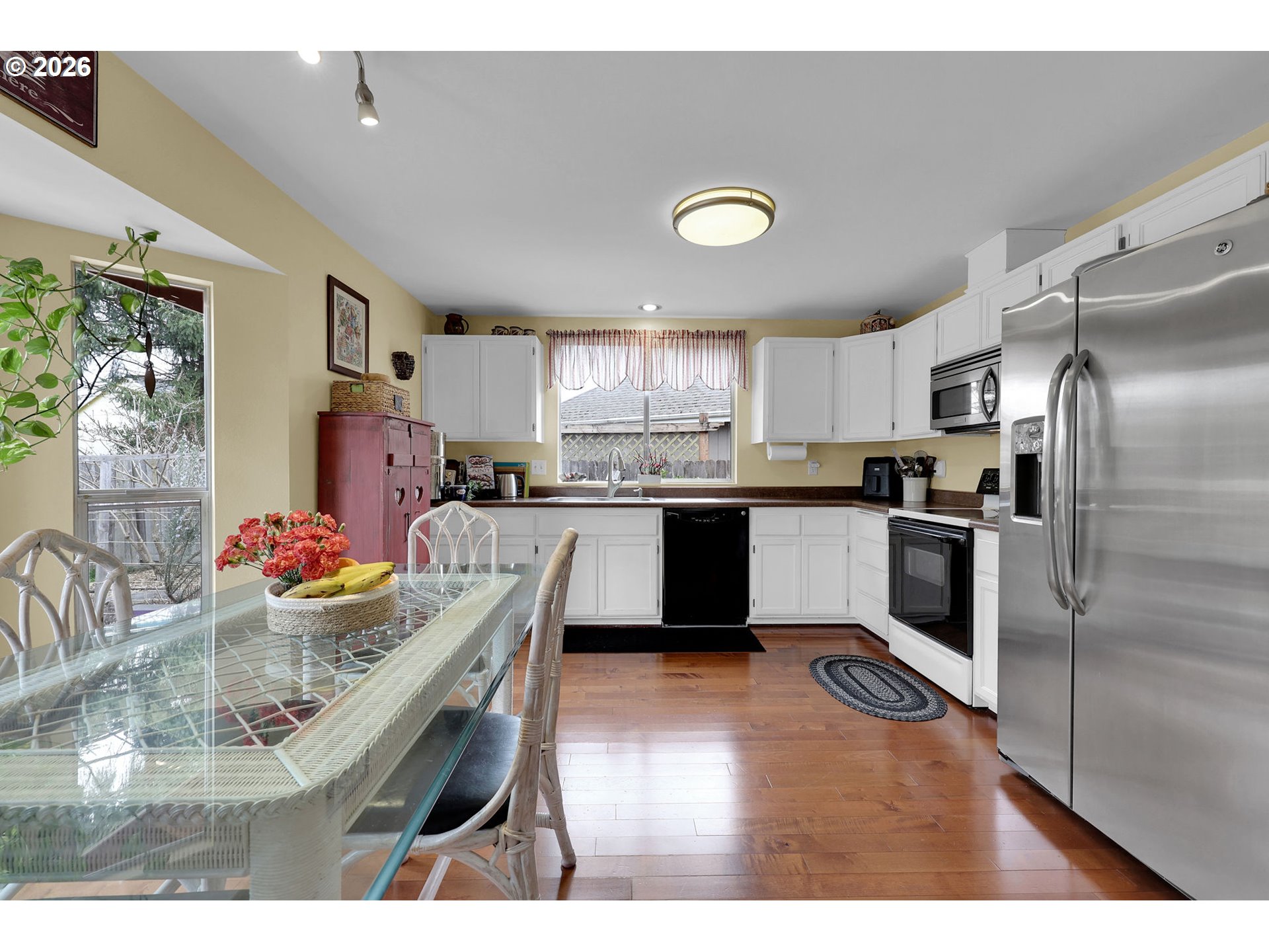 4452 Jessica Drive Springfield, OR 97478 - Photo 11 of 43 a kitchen with stainless steel appliances granite countertop a refrigerator and a sink