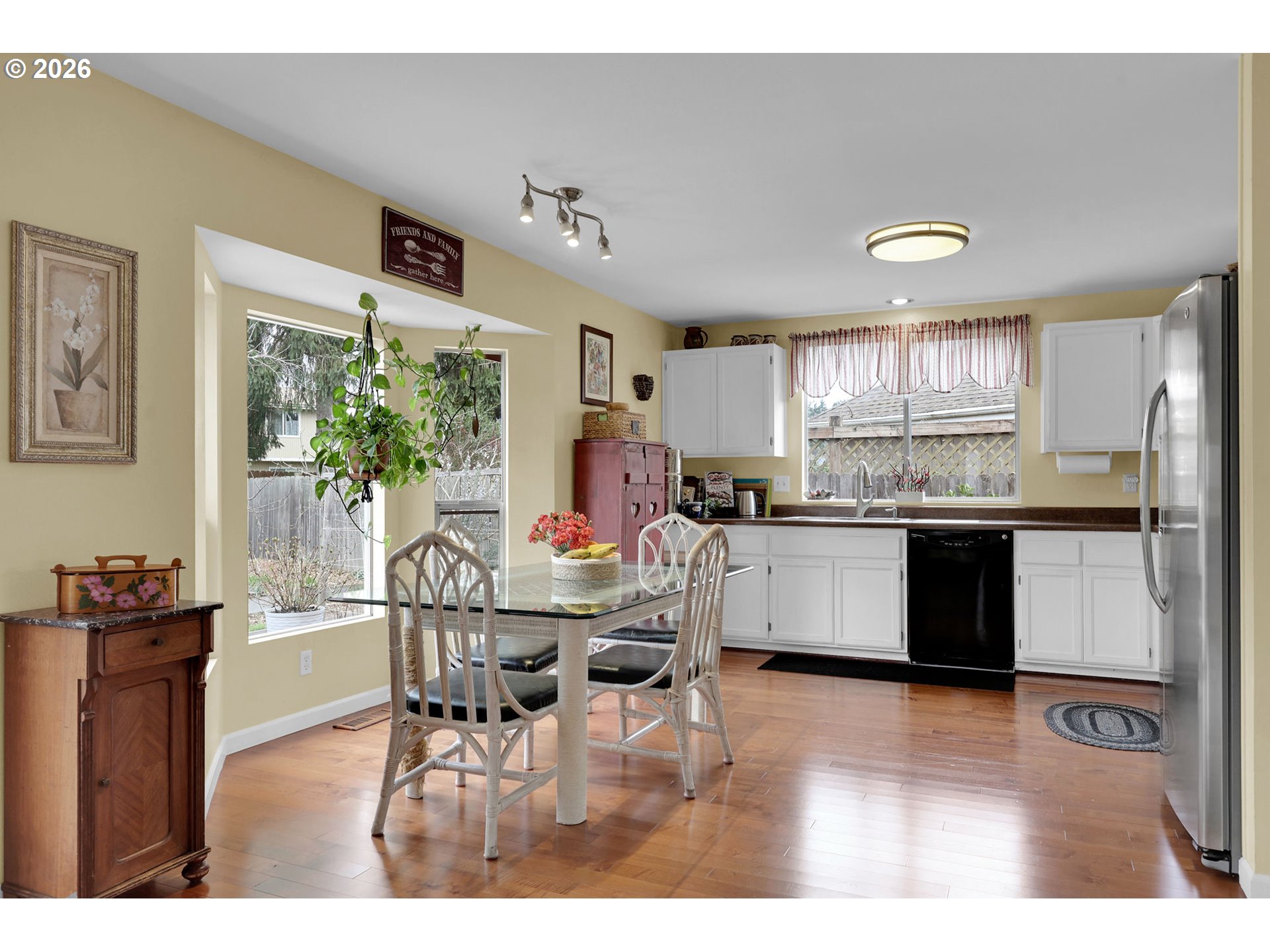 4452 Jessica Drive Springfield, OR 97478 - Photo 13 of 43 a kitchen with stainless steel appliances kitchen island granite countertop a refrigerator and microwave