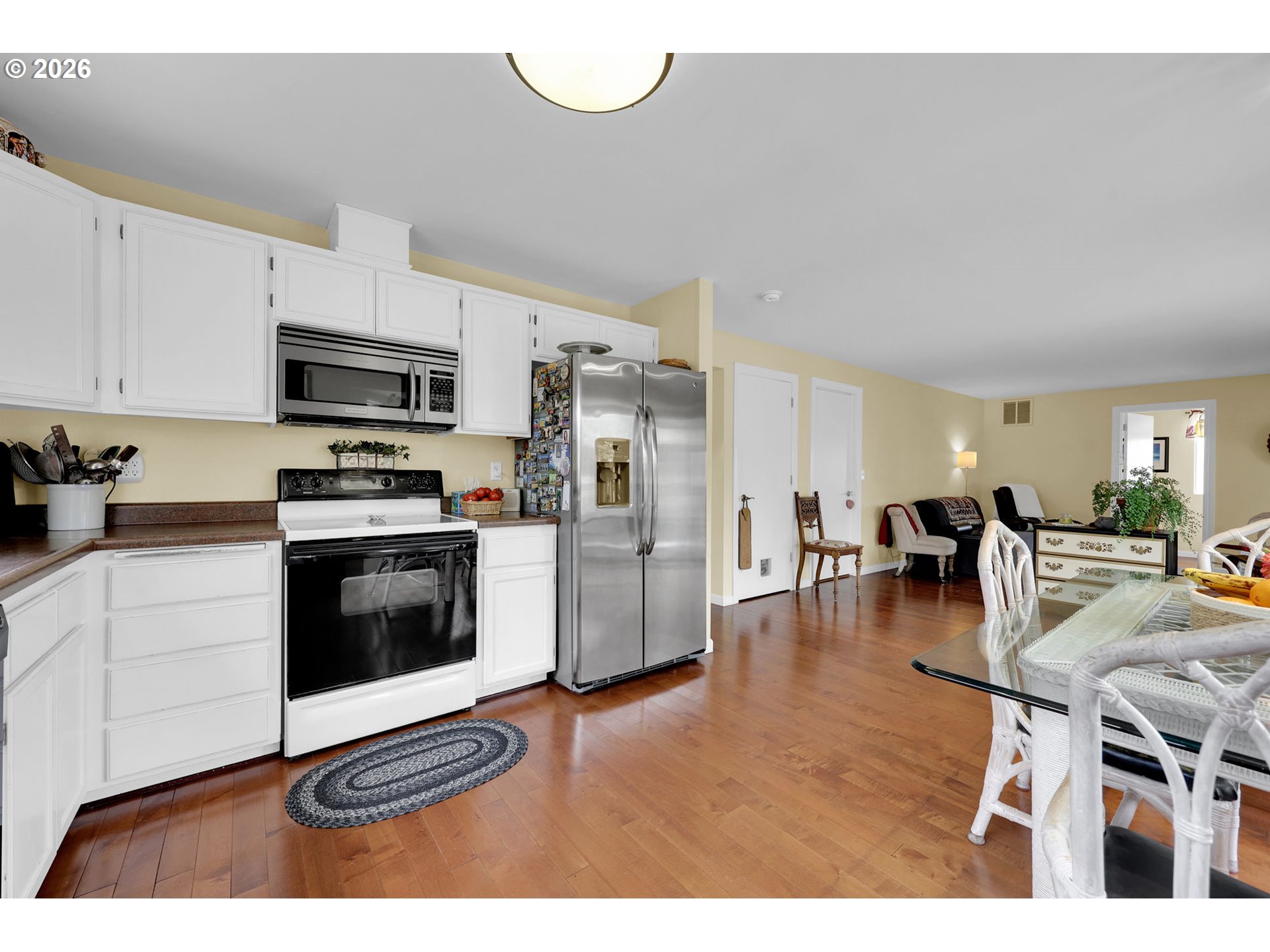 4452 Jessica Drive Springfield, OR 97478 - Photo 15 of 43 a kitchen with stainless steel appliances granite countertop a stove a sink a refrigerator and a microwave