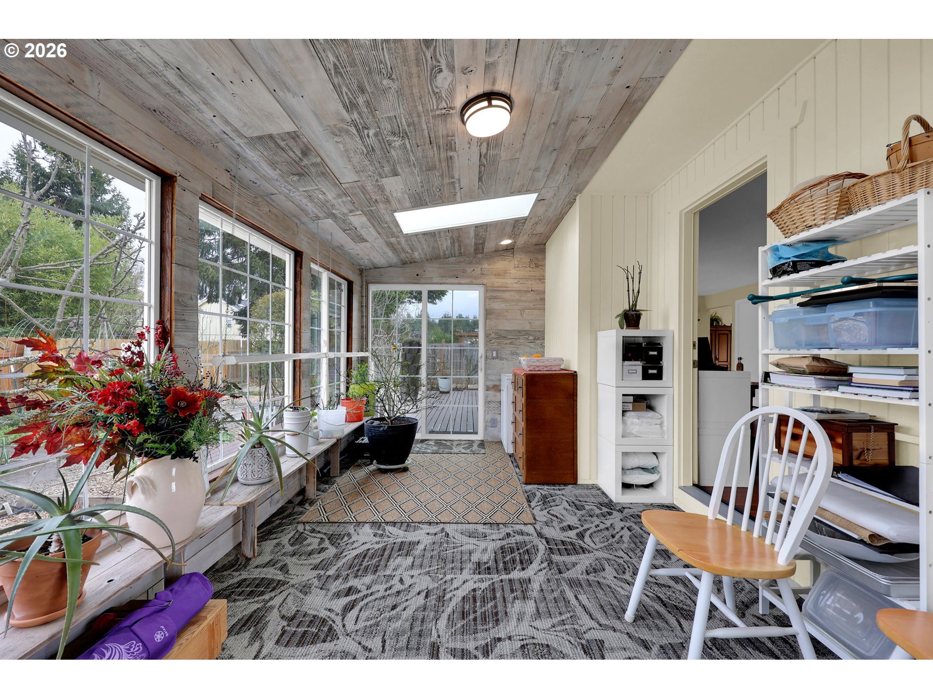 4452 Jessica Drive Springfield, OR 97478 - Photo 22 of 43 a living room with furniture fireplace and a large window