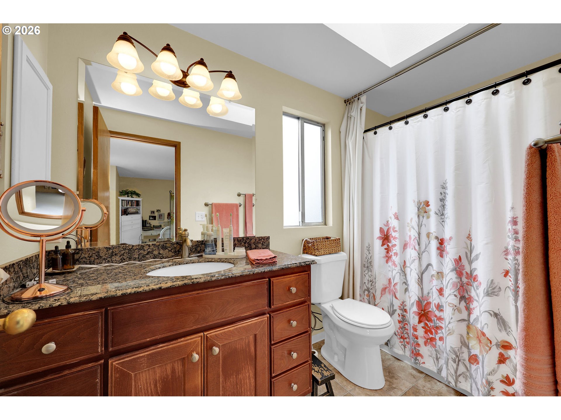 4452 Jessica Drive Springfield, OR 97478 - Photo 26 of 43 a bathroom with a sink a toilet and a mirror