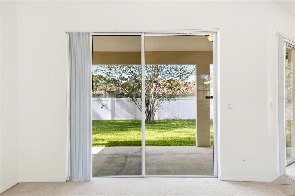 29 East Diamond Drive Palm Coast, FL 32164 - Photo 48 of 55 a view of a back yard from a room