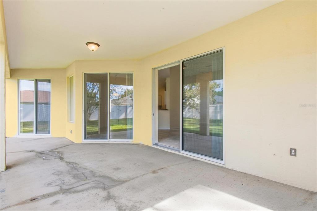 29 East Diamond Drive Palm Coast, FL 32164 - Photo 50 of 55 a view of a big room with windows and entryway