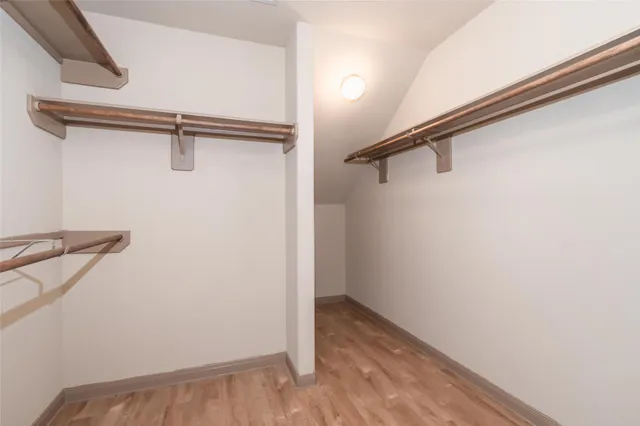 a view of a room with racks on the wall