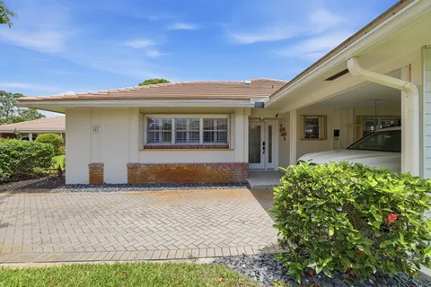 $475,000 | 103 Villa Circle, Atlantis, FL 33462