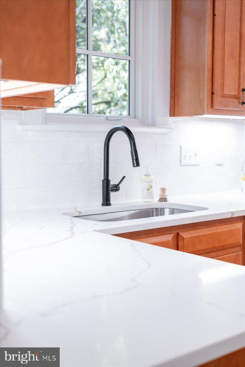 4937 Brandywine Street Northwest Washington, DC 20016 - Photo 16 of 53 a close view of sink and tap