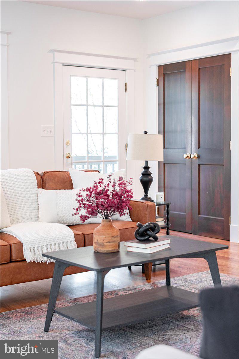 4937 Brandywine Street Northwest Washington, DC 20016 - Photo 19 of 53 a living room with furniture and a window