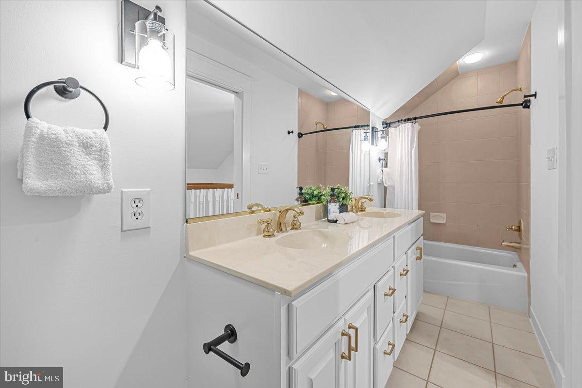 4937 Brandywine Street Northwest Washington, DC 20016 - Photo 37 of 53 a bathroom with a sink and a mirror