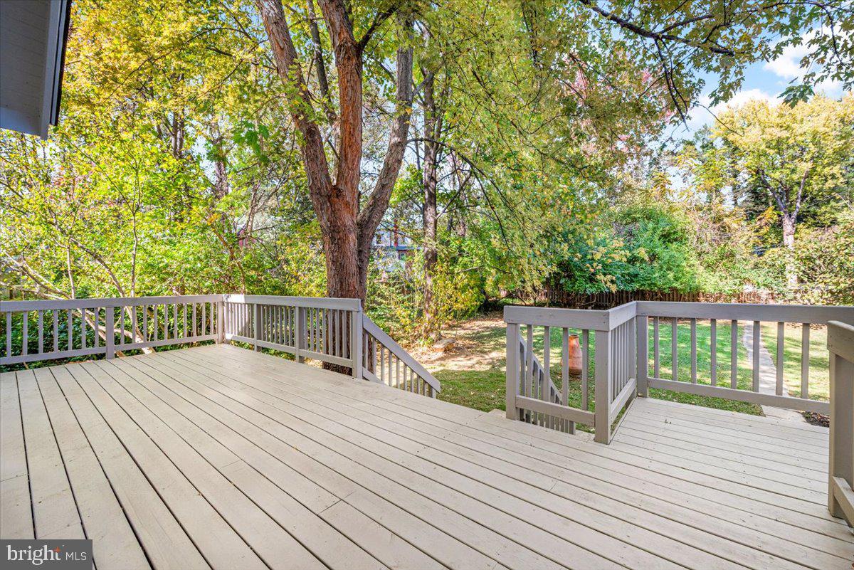 4937 Brandywine Street Northwest Washington, DC 20016 - Photo 40 of 53 a view of deck with wooden floor and fence