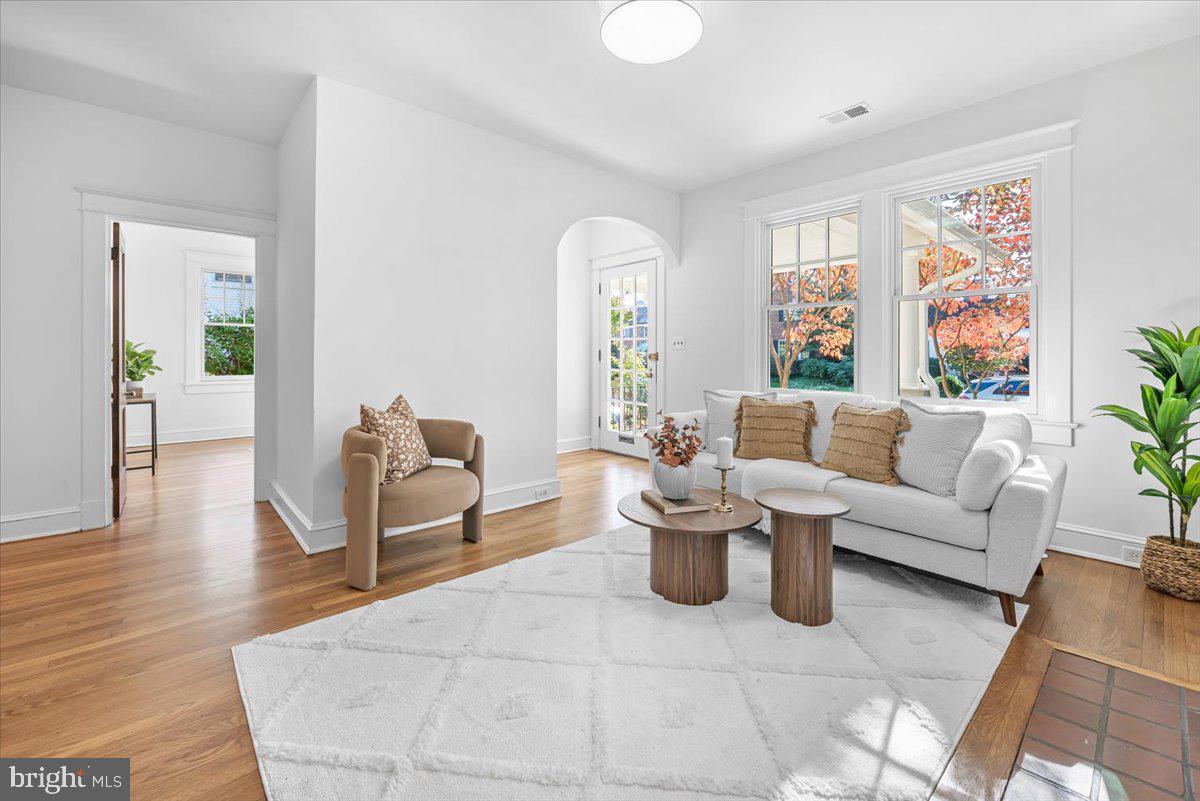 4937 Brandywine Street Northwest Washington, DC 20016 - Photo 5 of 53 a living room with furniture and a large window