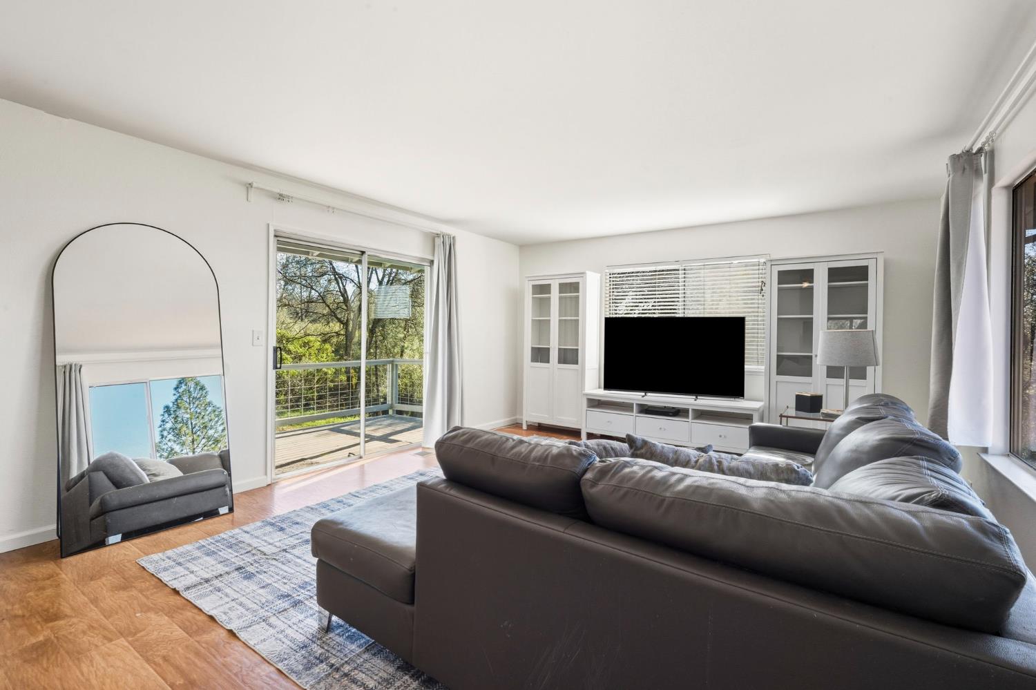 11172 North Ponderosa Way Rough and Ready, CA 95975 - Photo 11 of 47 a living room with furniture and a flat screen tv
