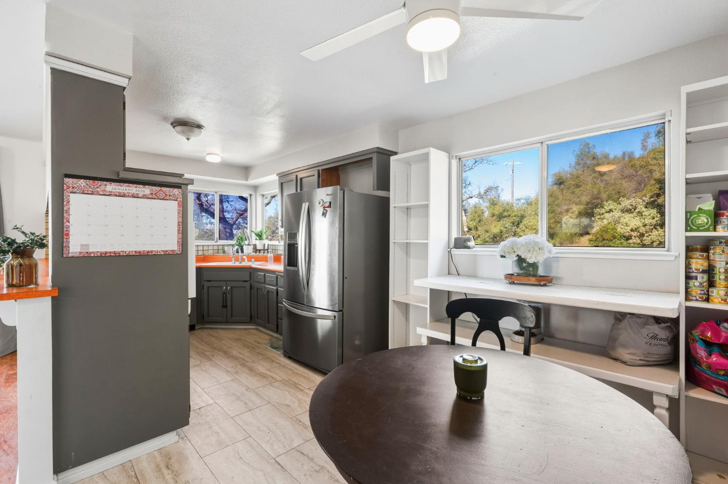 11172 North Ponderosa Way Rough and Ready, CA 95975 - Photo 18 of 47 a kitchen with refrigerator and window