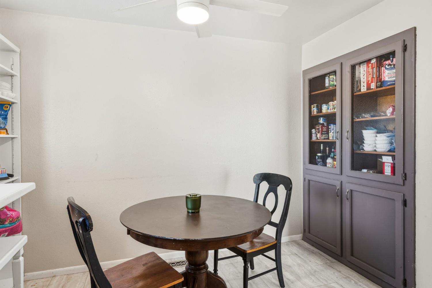 11172 North Ponderosa Way Rough and Ready, CA 95975 - Photo 20 of 47 a view of a dining room with furniture and wooden floor