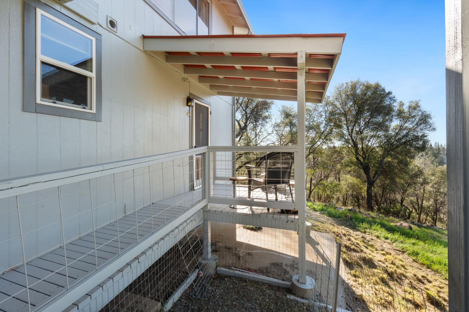 11172 North Ponderosa Way Rough and Ready, CA 95975 - Photo 32 of 47 a balcony with view of backyard of the house