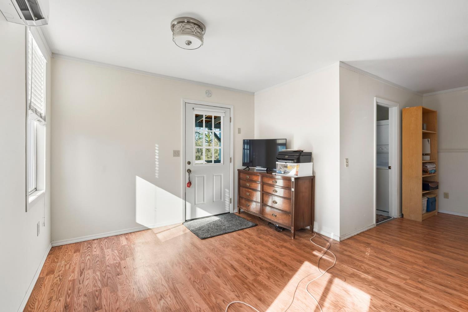 11172 North Ponderosa Way Rough and Ready, CA 95975 - Photo 34 of 47 a bedroom with a bed and a flat screen tv