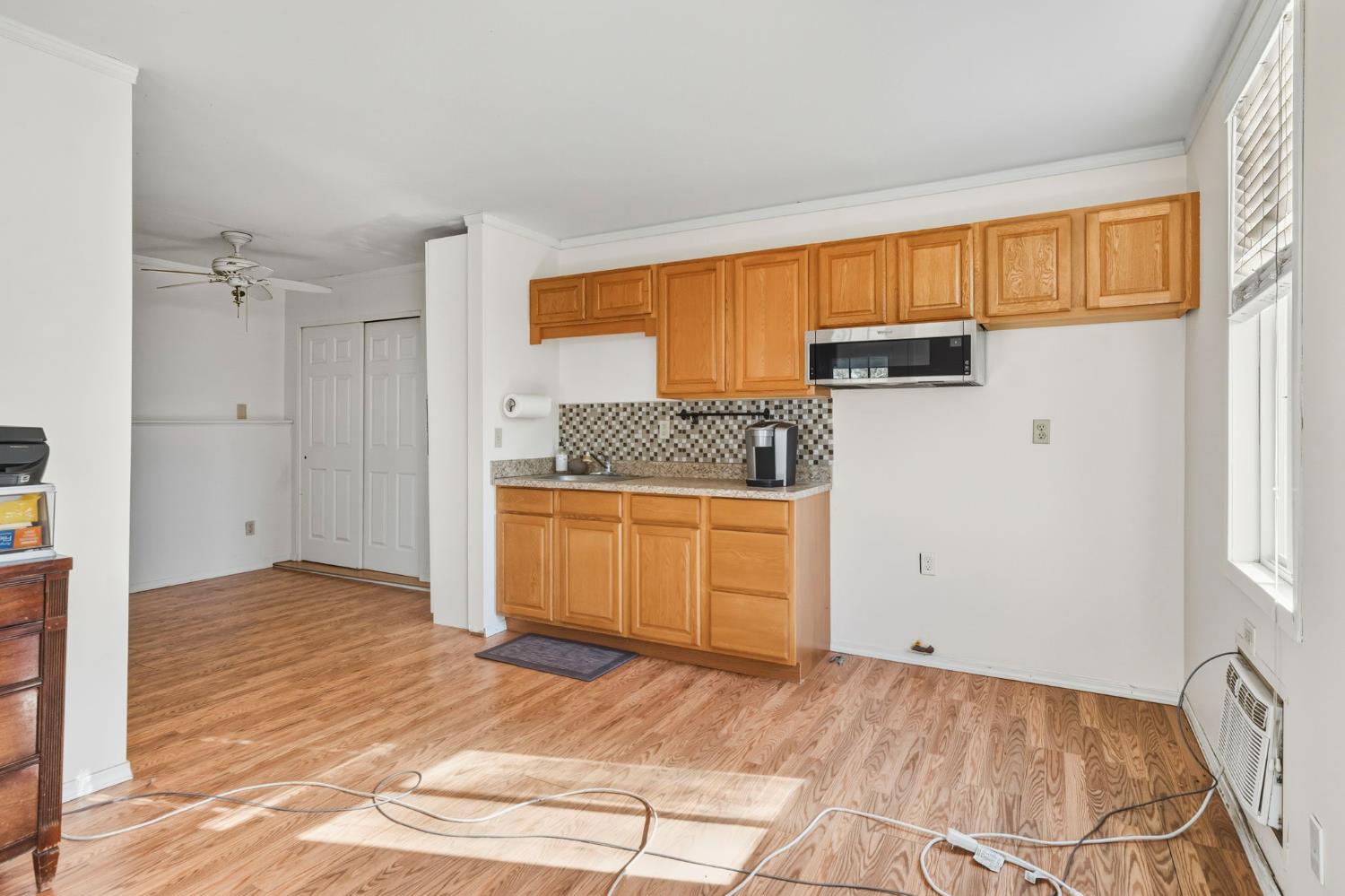 11172 North Ponderosa Way Rough and Ready, CA 95975 - Photo 35 of 47 a view of a kitchen with a sink and cabinets