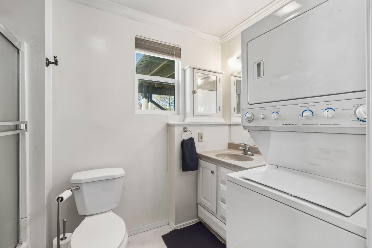 11172 North Ponderosa Way Rough and Ready, CA 95975 - Photo 38 of 47 a bathroom with a sink and a toilet