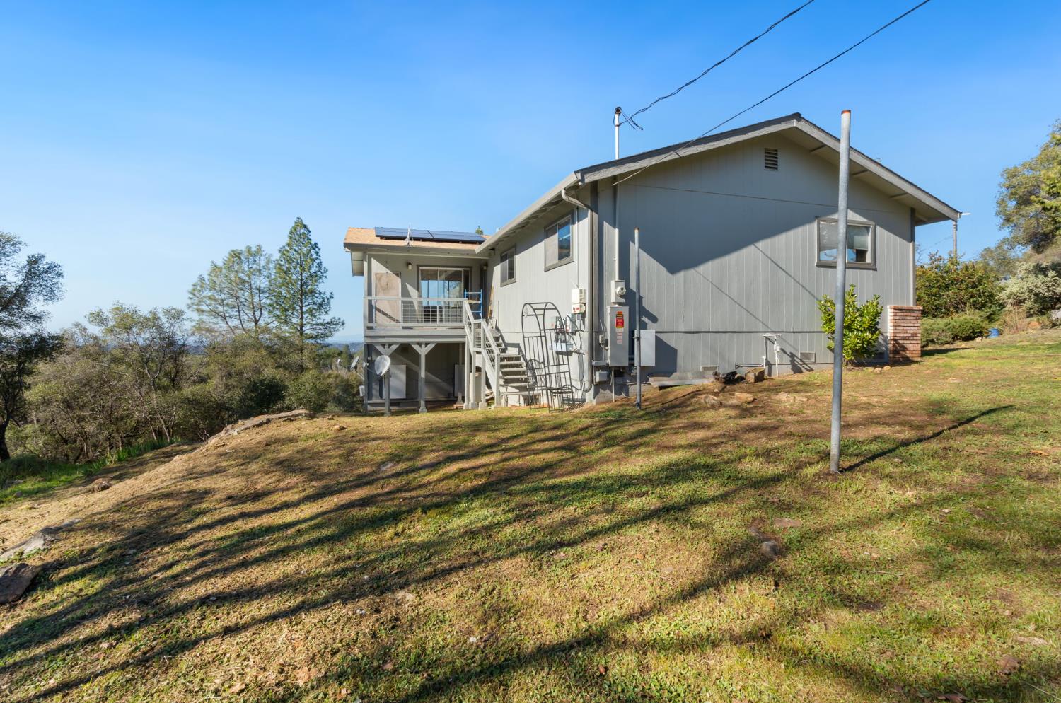 11172 North Ponderosa Way Rough and Ready, CA 95975 - Photo 40 of 47 a view of a house with a yard