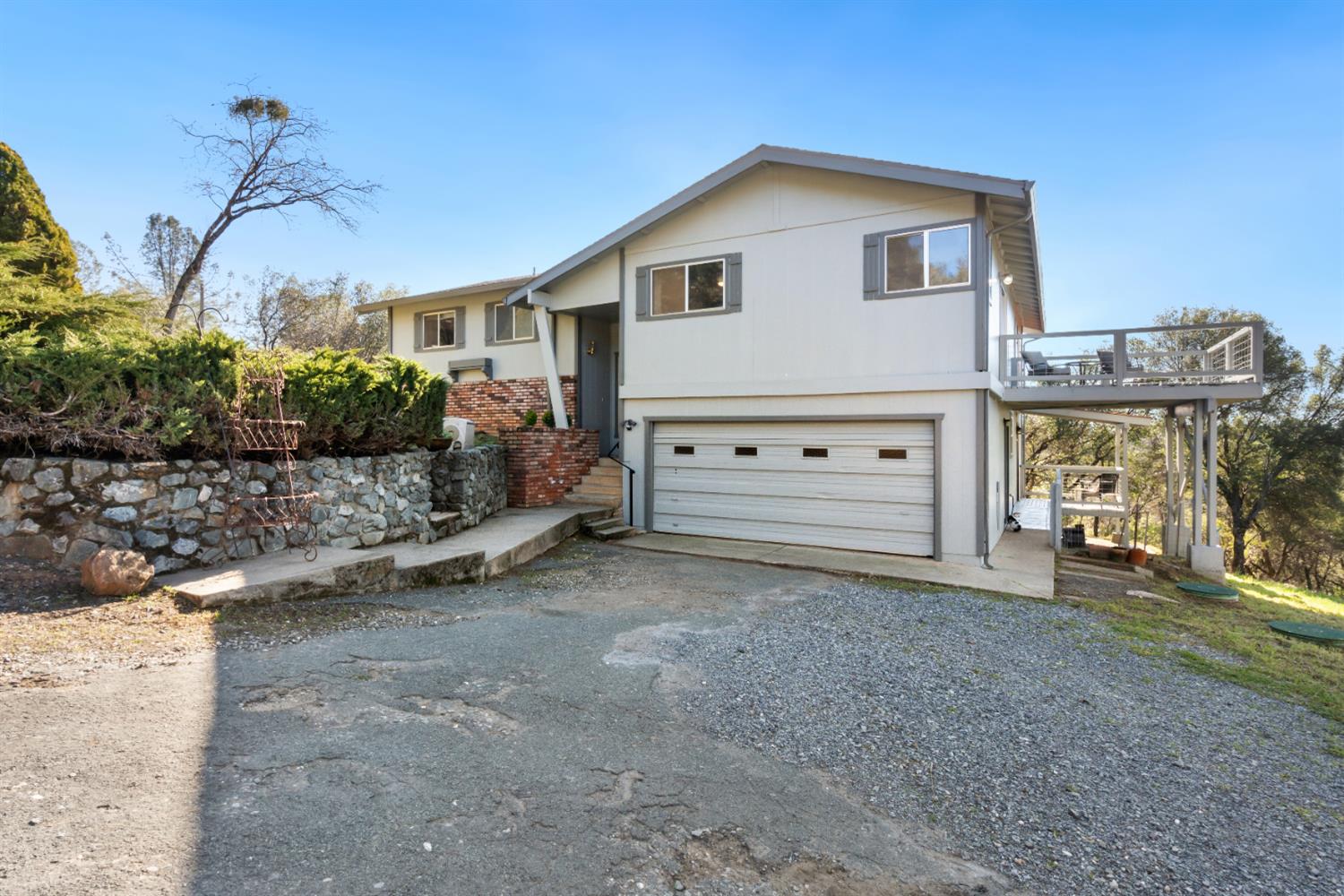 11172 North Ponderosa Way Rough and Ready, CA 95975 - Photo 5 of 47 a view of a house with a yard