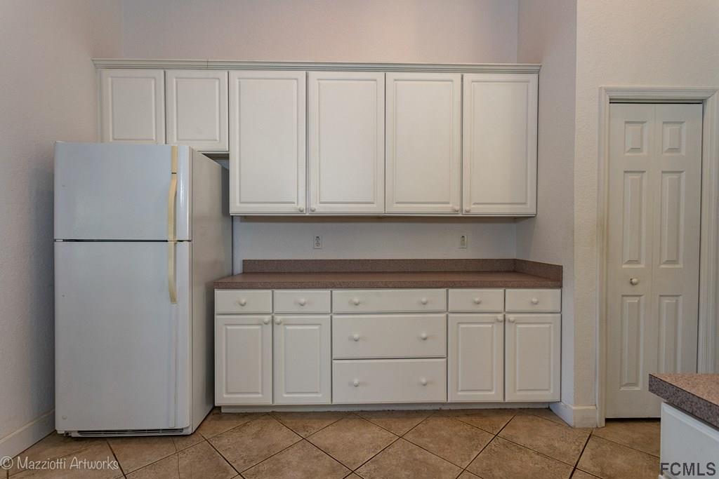 10 Eagle Place Palm Coast, FL 32164 - Photo 12 of 34 Lots of Cabinets & Pot Drawers, too
