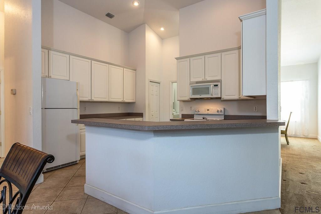 10 Eagle Place Palm Coast, FL 32164 - Photo 9 of 34 High Ceilings, Recessed Can Lights