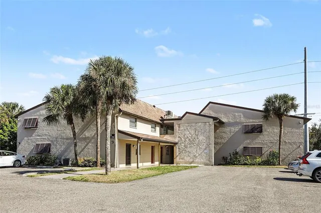a view of a building with a street
