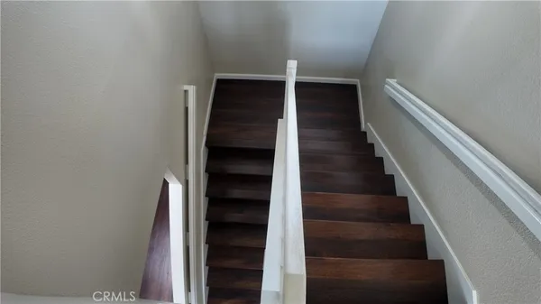 a bathroom with a shower and toilet