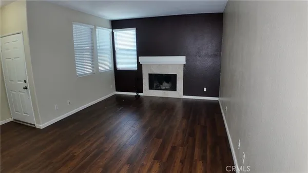 a kitchen with granite countertop a sink and a stove top oven
