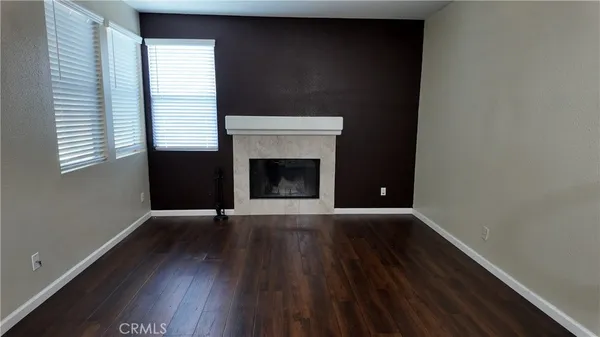 a stove top oven sitting inside of a kitchen
