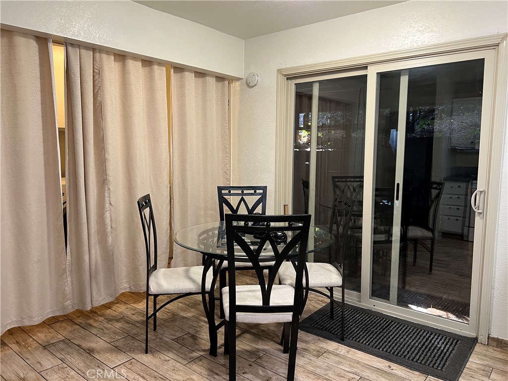 22903 Waters Crestline, CA 92325 - Photo 10 of 22 a view of a dining room with furniture and window