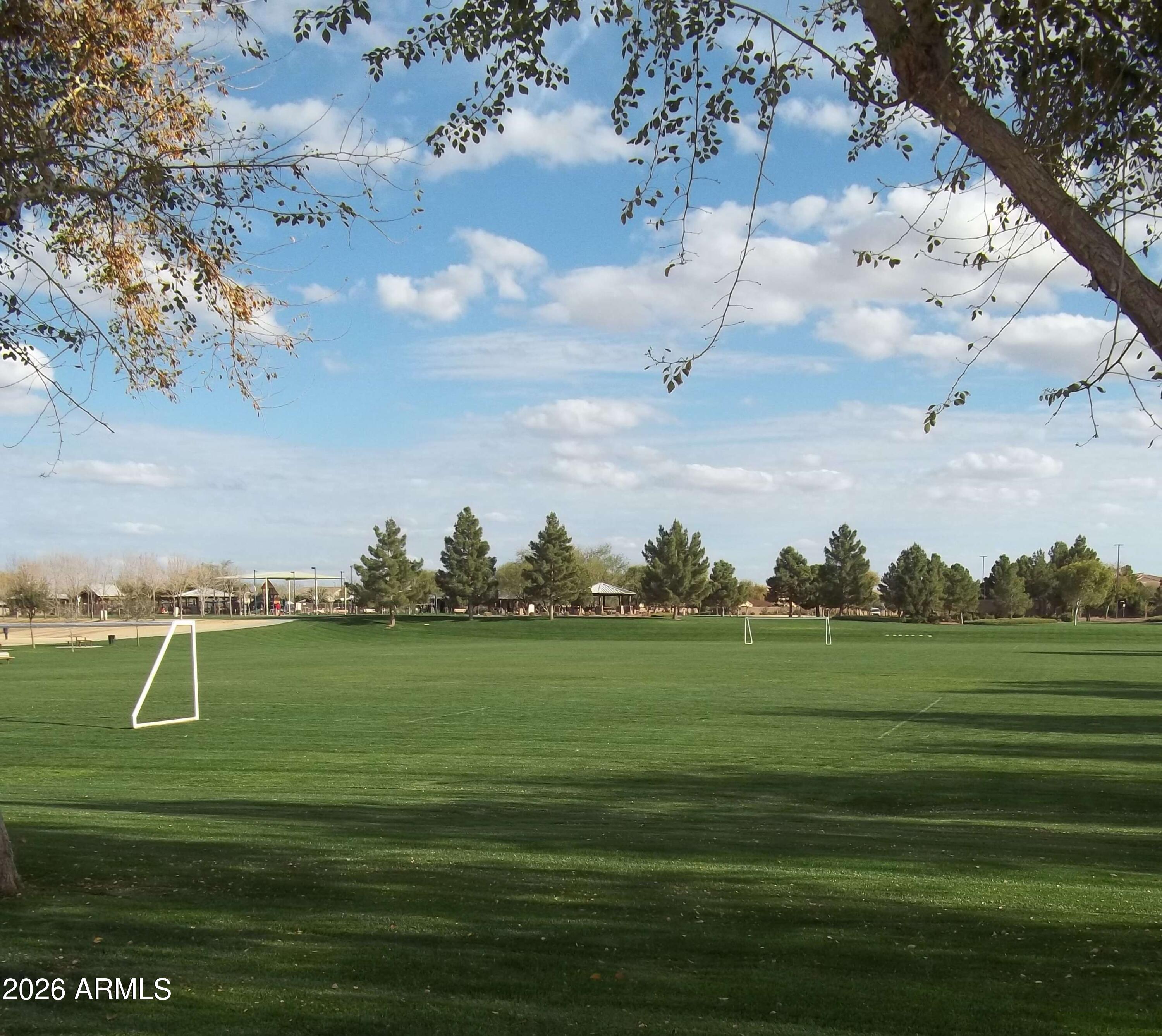 4168 East Sandy Way Gilbert, AZ 85297 - Photo 42 of 47 a view of a golf course with a lake