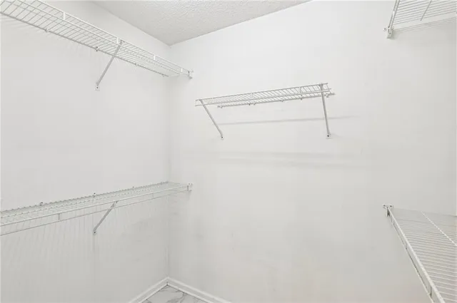 a view of a room with racks on the wall