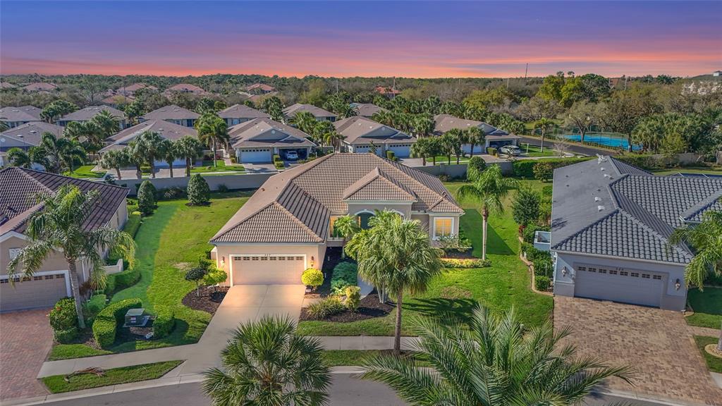 357 Marsh Creek Road Venice, FL 34292 - Photo 1 of 70 an aerial view of a house with a garden